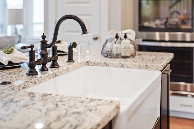4605 Hessey Rd, Mount Juliet, TN 37122 - kitchen view of a sink and light stone counters