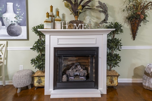 147 Crimson Dr, Winchester, TN 37398 - detailed view of wood finished floors, a fireplace, and baseboards
