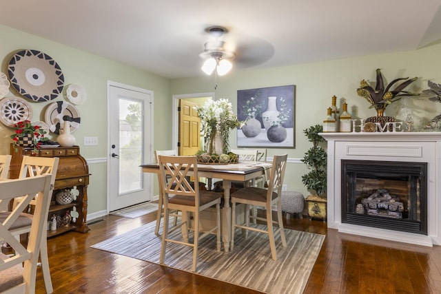 147 Crimson Dr, Winchester, TN 37398 - dining space featuring hardwood / wood-style floors, a ceiling fan, and a fireplace