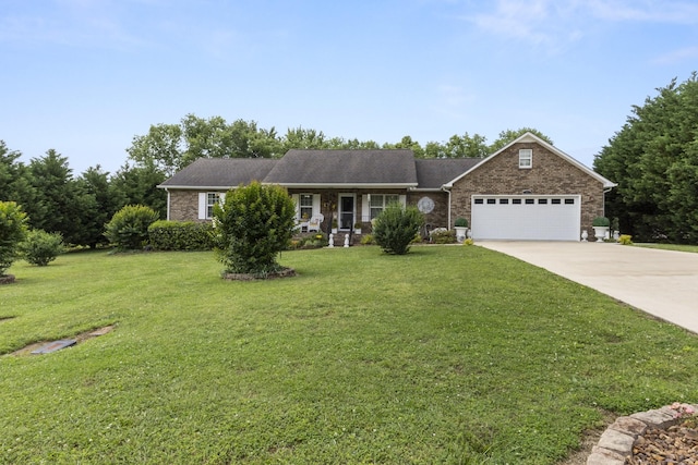 147 Crimson Dr, Winchester, TN 37398 - ranch-style house featuring a garage, driveway, a front yard, brick siding, and covered porch