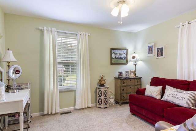 147 Crimson Dr, Winchester, TN 37398 - living area featuring light colored carpet, ceiling fan, and baseboards