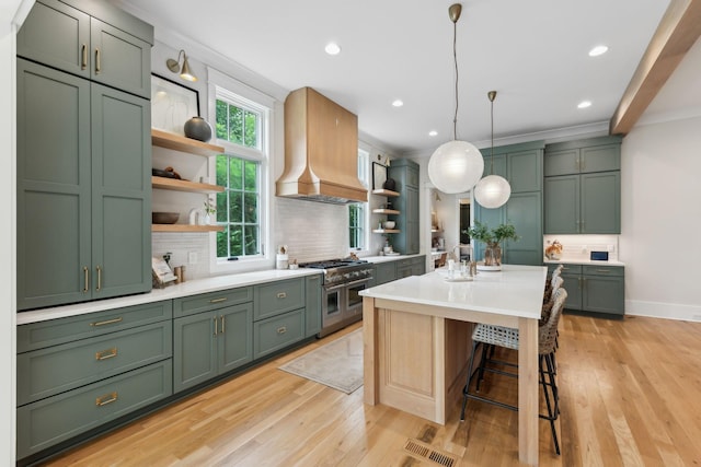 1040B Battery Ln E, Nashville, TN 37220 - kitchen featuring green cabinetry, open shelves, custom exhaust hood, double oven range, and decorative backsplash