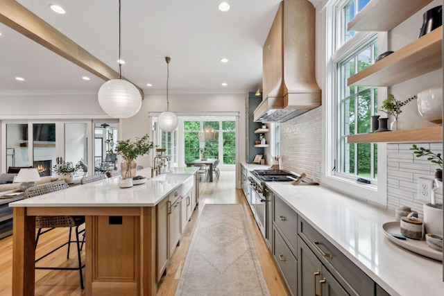 1040B Battery Ln E, Nashville, TN 37220 - kitchen with open shelves, gray cabinets, custom exhaust hood, recessed lighting, and crown molding