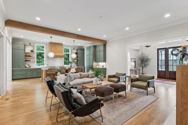 1040B Battery Ln E, Nashville, TN 37220 - living room featuring light wood finished floors, healthy amount of natural light, recessed lighting, and crown molding