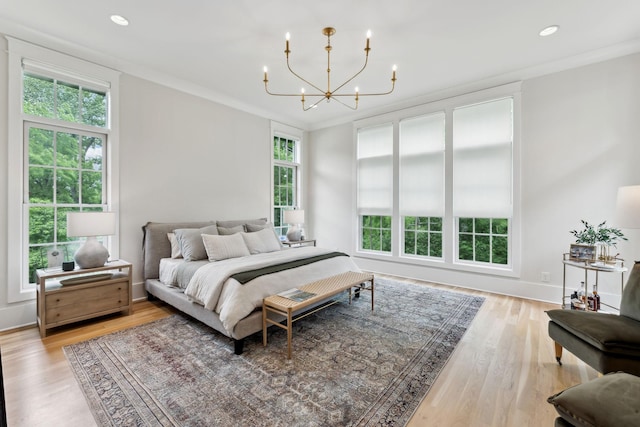 1040B Battery Ln E, Nashville, TN 37220 - bedroom featuring a chandelier, light wood-style flooring, recessed lighting, crown molding, and baseboards