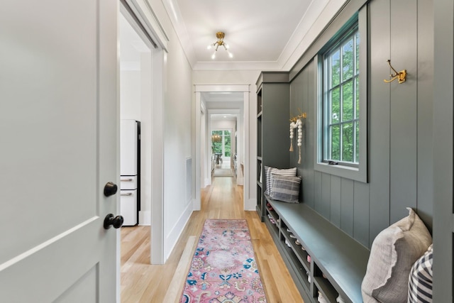 1040B Battery Ln E, Nashville, TN 37220 - mudroom featuring healthy amount of natural light, light wood-style floors, ornamental molding, and baseboards