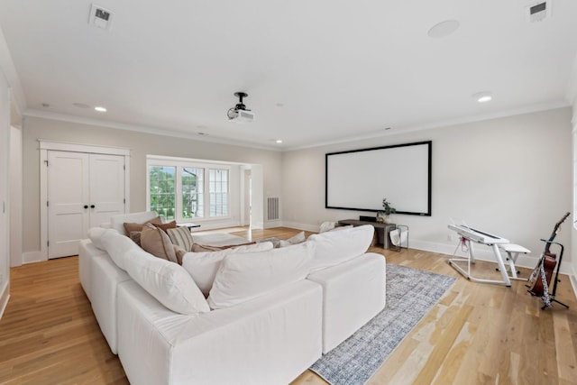 1040B Battery Ln E, Nashville, TN 37220 - home theater featuring crown molding, recessed lighting, baseboards, and light wood-style flooring