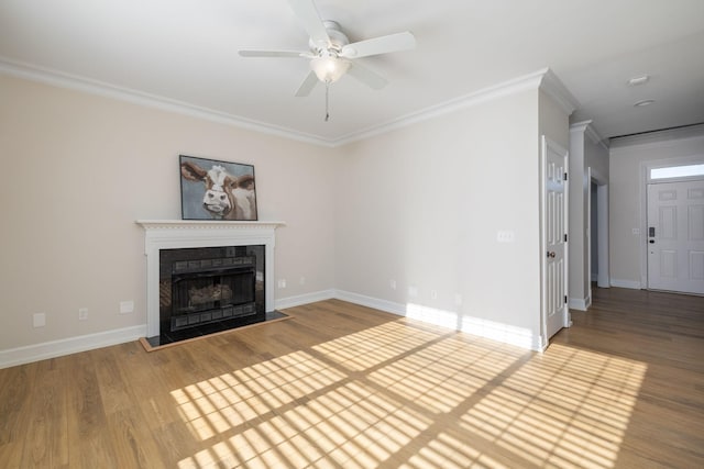 100 Nancy Ct, Hermitage, TN 37076 - unfurnished living room with a fireplace, ceiling fan, ornamental molding, wood finished floors, and baseboards
