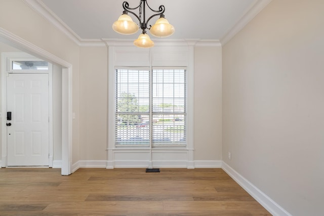 100 Nancy Ct, Hermitage, TN 37076 - foyer entrance with a chandelier, wood finished floors, plenty of natural light, ornamental molding, and baseboards