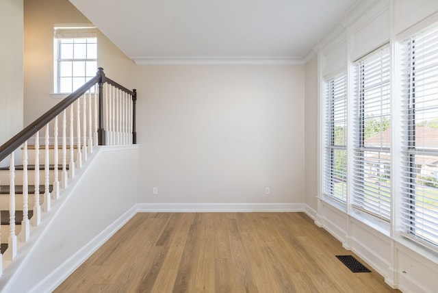 100 Nancy Ct, Hermitage, TN 37076 - unfurnished room with light wood-type flooring, plenty of natural light, and ornamental molding
