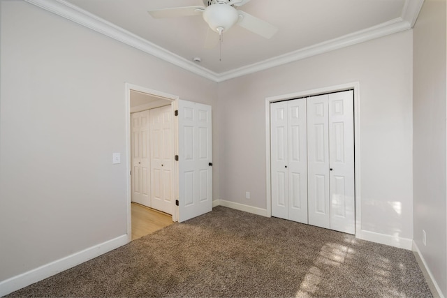 100 Nancy Ct, Hermitage, TN 37076 - unfurnished bedroom featuring carpet, crown molding, baseboards, a ceiling fan, and a closet