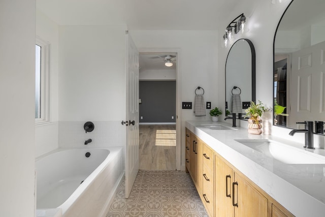 100 Nancy Ct, Hermitage, TN 37076 - full bathroom featuring double vanity, ceiling fan, a bath, and tile patterned floors