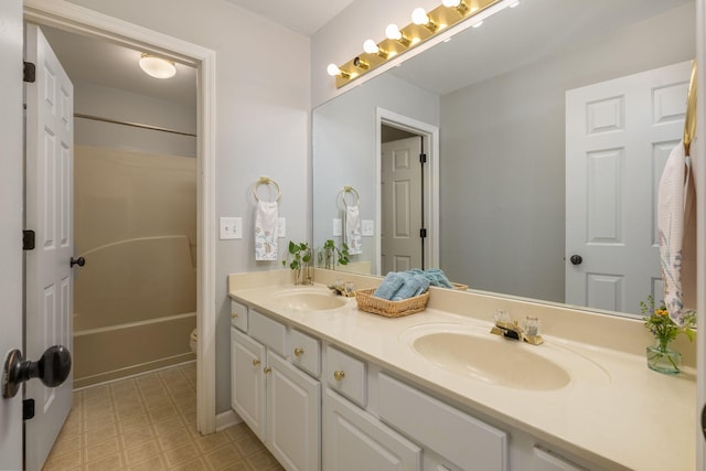 100 Nancy Ct, Hermitage, TN 37076 - bathroom with double vanity, toilet, bathing tub / shower combination, and tile patterned floors