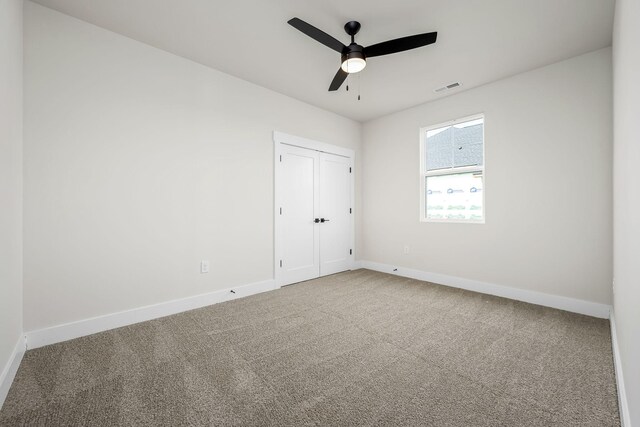 0 Stonehorn Dr, Bell Buckle, TN 37020 - unfurnished bedroom with baseboards, carpet flooring, ceiling fan, and a closet