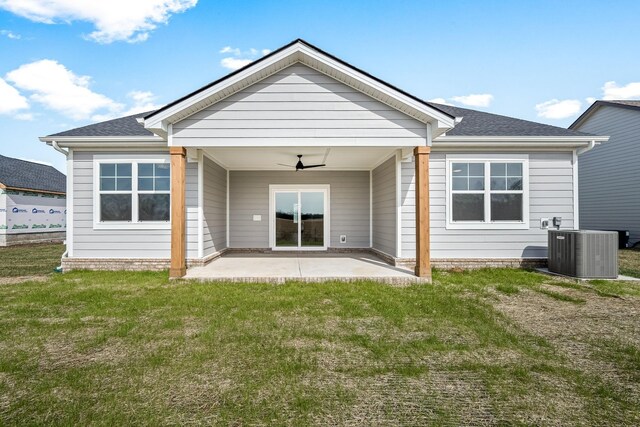 0 Stonehorn Dr, Bell Buckle, TN 37020 - back of property featuring ceiling fan, central AC unit, a yard, a patio area, and roof with shingles
