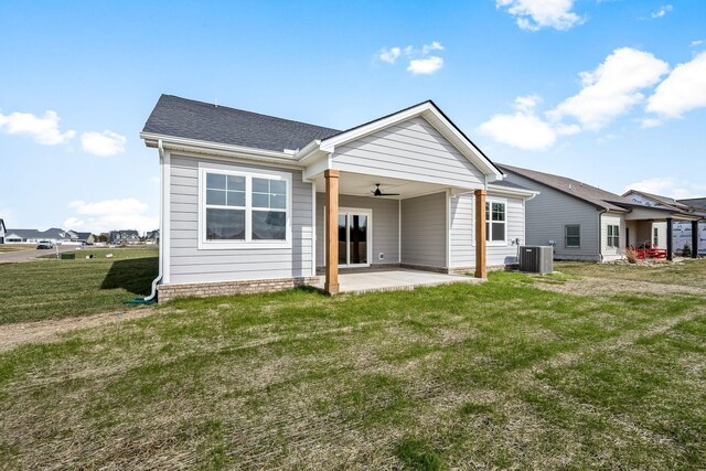 0 Stonehorn Dr, Bell Buckle, TN 37020 - rear view of house with a ceiling fan, a patio, central air condition unit, a lawn, and a shingled roof