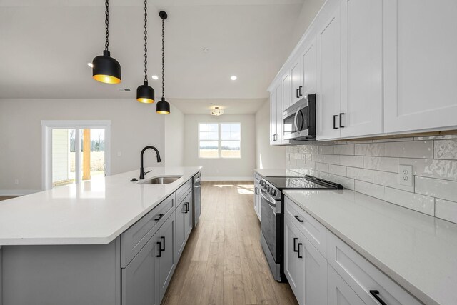 0 Stonehorn Dr, Bell Buckle, TN 37020 - kitchen with a sink, stainless steel appliances, light countertops, light wood finished floors, and recessed lighting