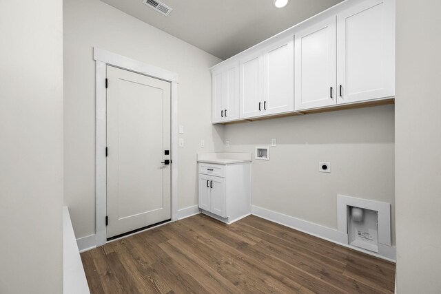 0 Stonehorn Dr, Bell Buckle, TN 37020 - laundry area with cabinet space, washer hookup, dark wood-type flooring, electric dryer hookup, and baseboards
