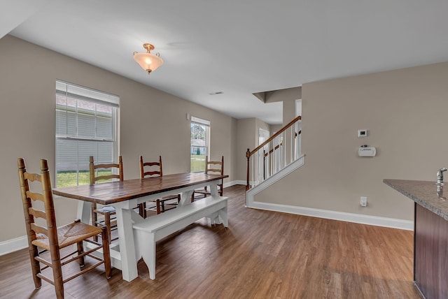 421 Willis Way, Columbia, TN 38401 - dining space featuring baseboards, wood finished floors, and stairs