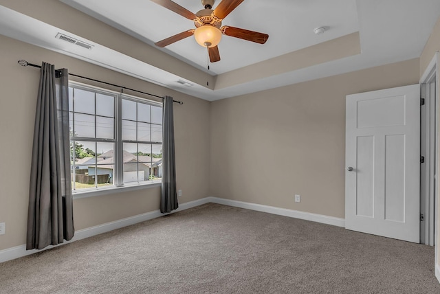 421 Willis Way, Columbia, TN 38401 - spare room with carpet floors, baseboards, ceiling fan, and a raised ceiling