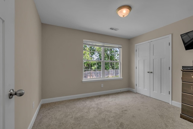 421 Willis Way, Columbia, TN 38401 - unfurnished bedroom with carpet, baseboards, and a closet