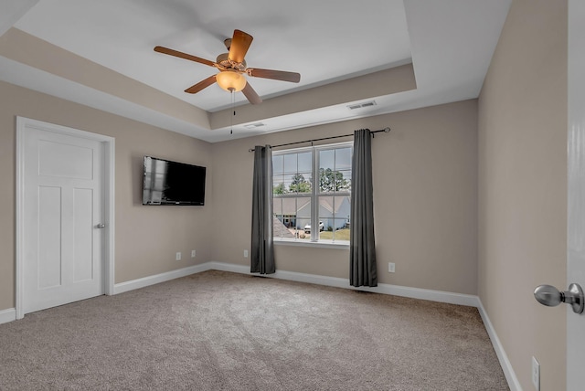 421 Willis Way, Columbia, TN 38401 - carpeted empty room with a tray ceiling, baseboards, and a ceiling fan