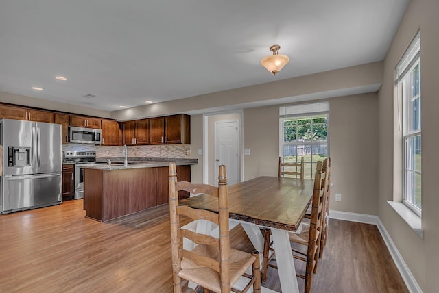 421 Willis Way, Columbia, TN 38401 - dining room with light wood-style flooring, baseboards, and recessed lighting