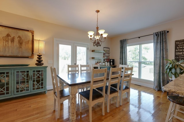 3715 Petty Ln, Columbia, TN 38401 - dining room with a chandelier and light wood-type flooring