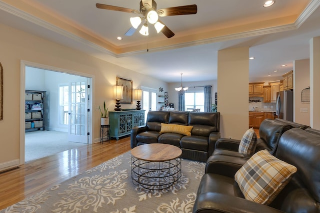 3715 Petty Ln, Columbia, TN 38401 - living area featuring light wood finished floors, a tray ceiling, a ceiling fan, a chandelier, and recessed lighting