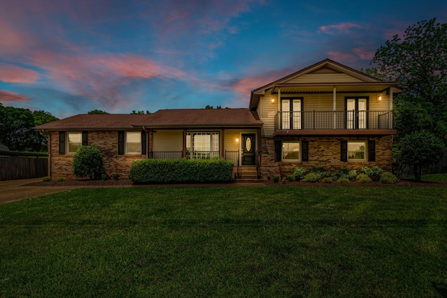 520 Almaville Rd, Smyrna, TN 37167 - split level home with a balcony, a front lawn, french doors, and brick siding