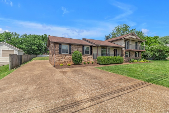 520 Almaville Rd, Smyrna, TN 37167 - split level home featuring roof with shingles, brick siding, and driveway