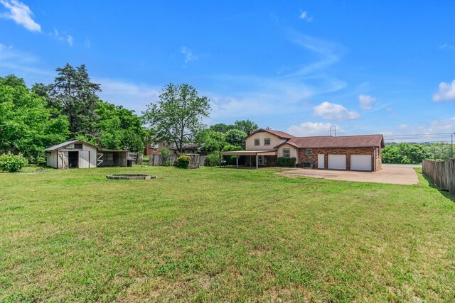 520 Almaville Rd, Smyrna, TN 37167 - view of yard with driveway and a garage