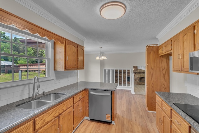 520 Almaville Rd, Smyrna, TN 37167 - kitchen with stainless steel appliances, a sink, decorative backsplash, crown molding, and a textured ceiling