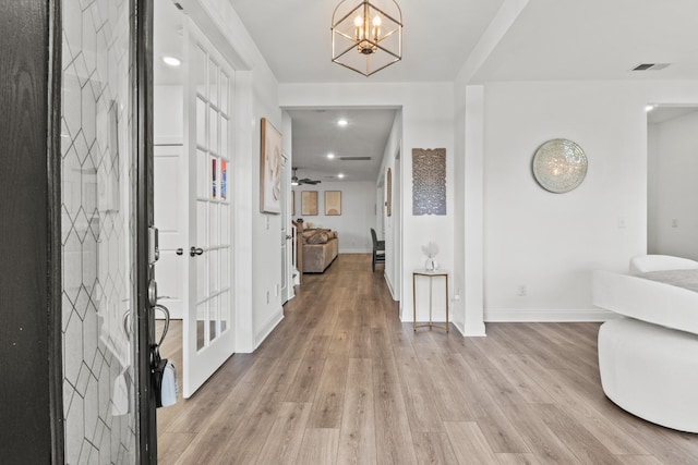 400 Parker Ct, Antioch, TN 37013 - entryway featuring baseboards, a chandelier, light wood finished floors, and recessed lighting