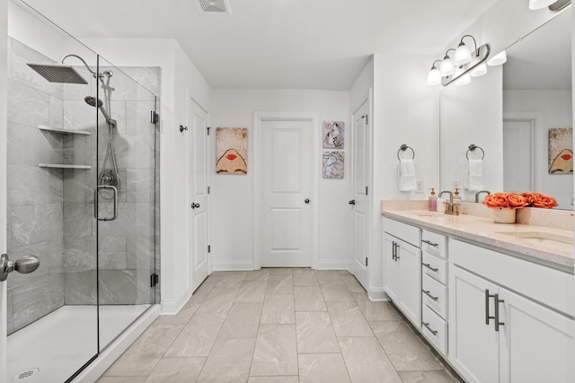 400 Parker Ct, Antioch, TN 37013 - bathroom featuring a stall shower, double vanity, marble finish floors, and baseboards