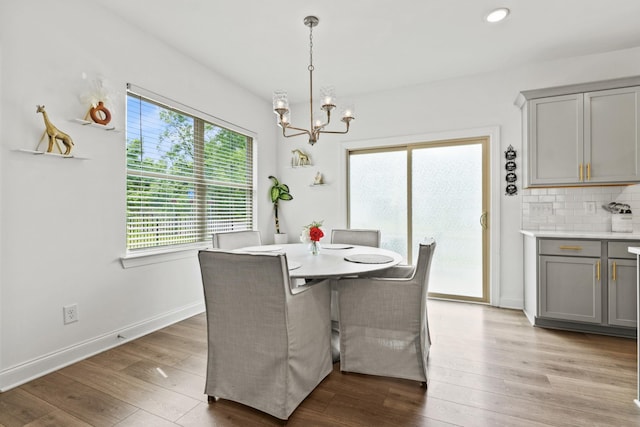 400 Parker Ct, Antioch, TN 37013 - dining room with a chandelier, wood finished floors, baseboards, and recessed lighting