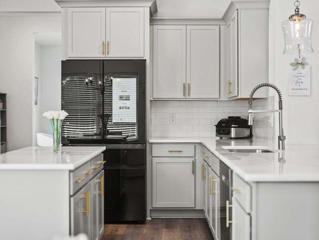 400 Parker Ct, Antioch, TN 37013 - kitchen featuring freestanding refrigerator, a sink, backsplash, and light countertops