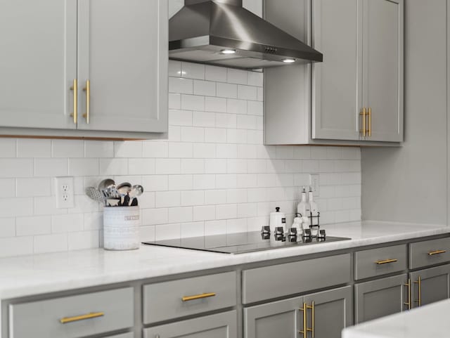 400 Parker Ct, Antioch, TN 37013 - kitchen featuring wall chimney exhaust hood, gray cabinets, black electric stovetop, decorative backsplash, and light countertops