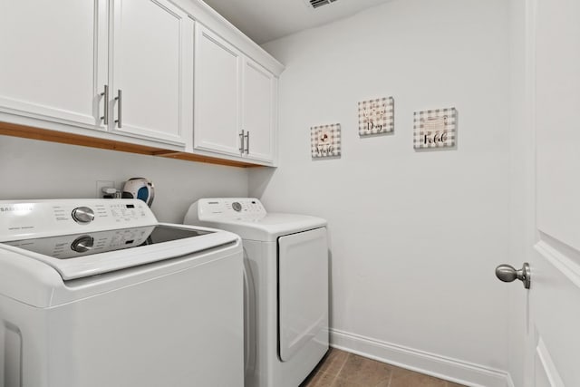 400 Parker Ct, Antioch, TN 37013 - washroom with cabinet space, washer and dryer, and baseboards