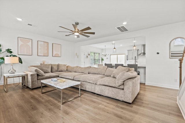 400 Parker Ct, Antioch, TN 37013 - living room featuring light wood-style flooring, ceiling fan, baseboards, and recessed lighting