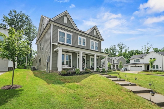 400 Parker Ct, Antioch, TN 37013 - view of front of home featuring a porch, a front lawn, and central air condition unit