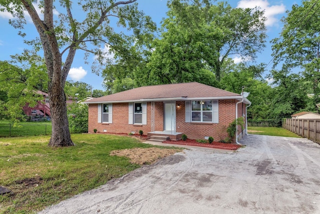 4904 Algonquin Trl, Antioch, TN 37013 - ranch-style house featuring dirt driveway, brick siding, and a shingled roof