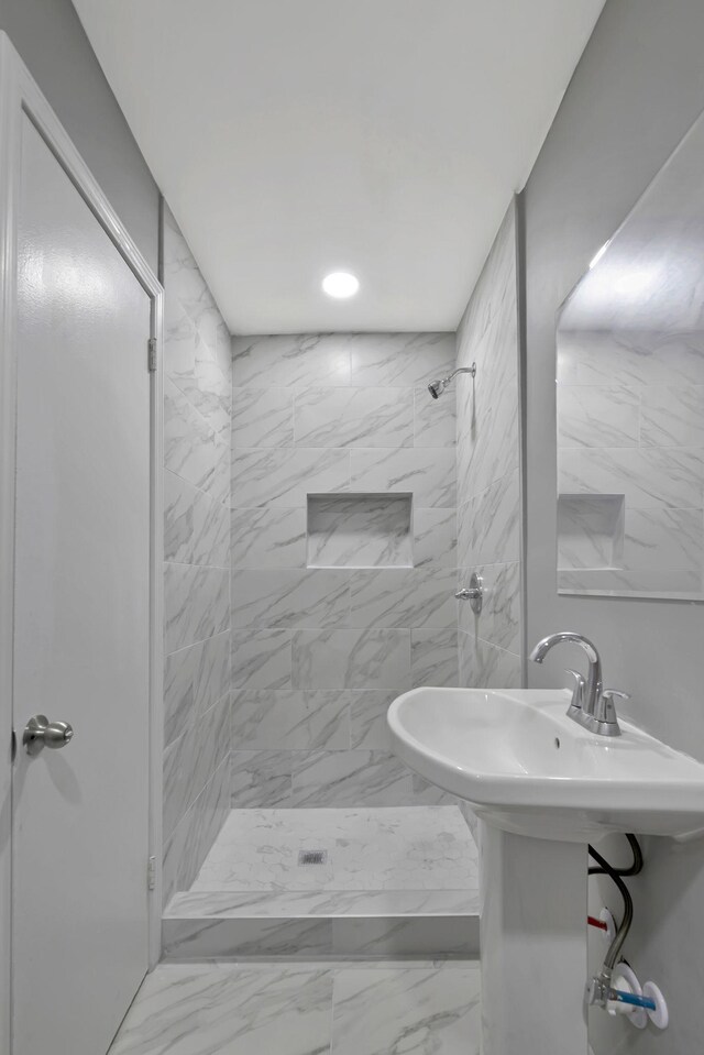 4904 Algonquin Trl, Antioch, TN 37013 - bathroom with a shower stall, marble look tile flooring, and recessed lighting