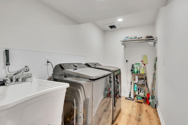 415 Isaac Dr, Goodlettsville, TN 37072 - washroom with washer and clothes dryer, light wood-style floors, and recessed lighting