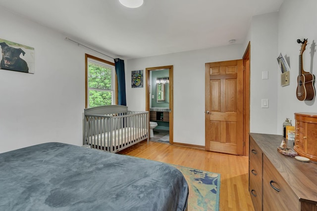 415 Isaac Dr, Goodlettsville, TN 37072 - bedroom featuring light wood-style flooring and baseboards
