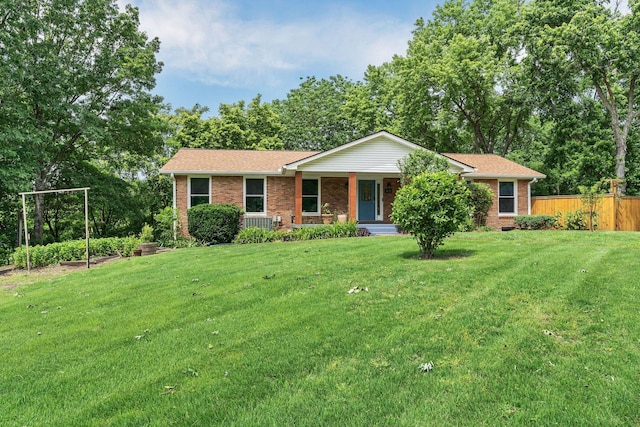 415 Isaac Dr, Goodlettsville, TN 37072 - ranch-style home featuring covered porch, brick siding, and a shingled roof