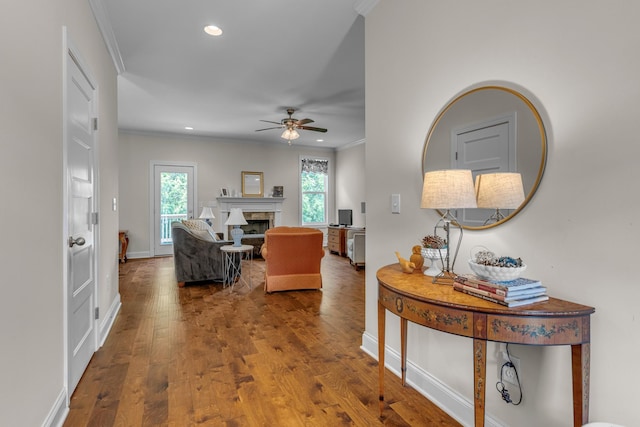 817 Tanager Pl, Lebanon, TN 37087 - living area with a ceiling fan, wood finished floors, recessed lighting, ornamental molding, and a fireplace