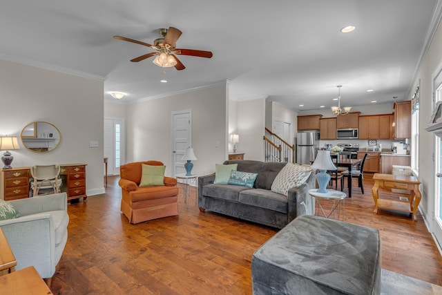 817 Tanager Pl, Lebanon, TN 37087 - living area with a ceiling fan, recessed lighting, crown molding, wood finished floors, and stairs