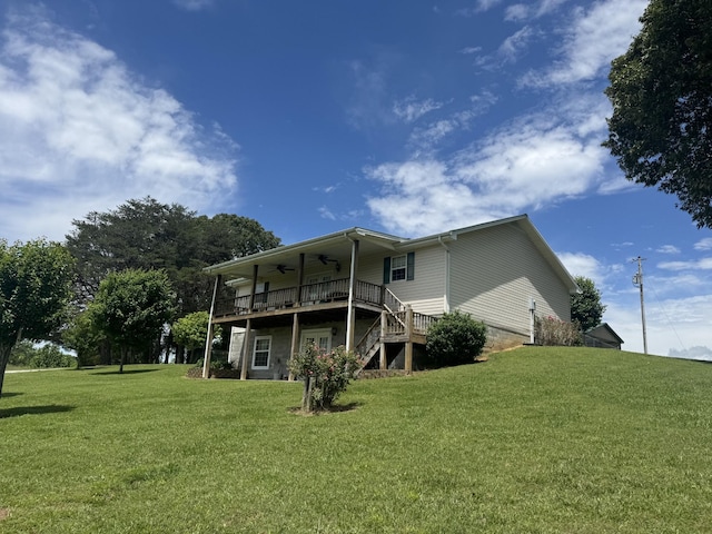 325 Lafayette Ct, Moss, TN 38575 - back of house with a ceiling fan, a yard, stairway, and a wooden deck