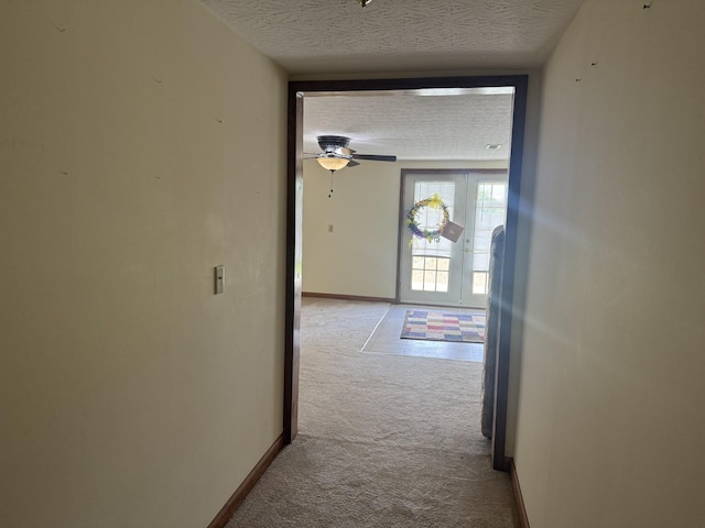 325 Lafayette Ct, Moss, TN 38575 - corridor featuring carpet, a textured ceiling, french doors, and baseboards